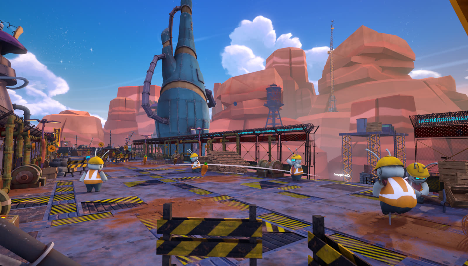 A colorful desert settlement with rocket-shaped towers and scaffolding in Hoppity-Hop